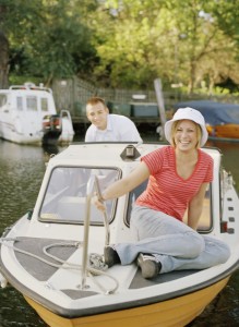 Young couple on a motorboat